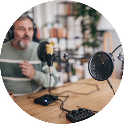 Podcast host recording in home studio with professional microphone and sound mixer